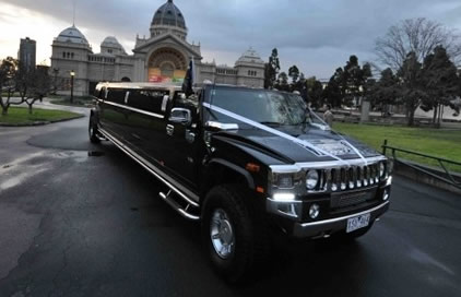 Black Hummer with 3 Bars Spread Throughout the Spacious Cabin
